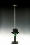 Burt, Laurie (1925-2015): Magritte STEIPS Out, dated 1979, Found object, resin. perspex, brass, aluminium and wood, 117 cms high. Presented by the artist.